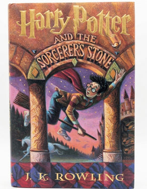 First American edition dust jacket for Harry Potter and the Sorcerer's Stone showing Harry Potter flying on a broom