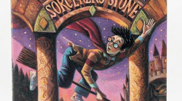 First American edition dust jacket for Harry Potter and the Sorcerer's Stone showing Harry Potter flying on a broom
