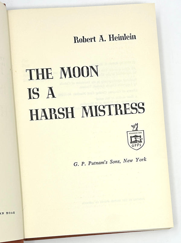 The Moon is a Harsh Mistress, Robert Heinlein. First Edition w/ Signed Card.