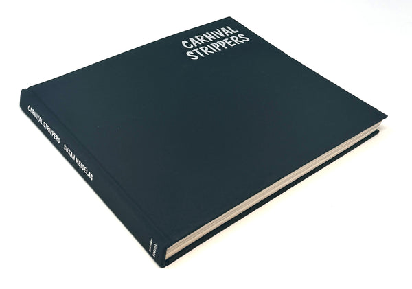 Carnival Strippers by Susan Meiselas, 2003 revised edition: silver-lettered front cloth binding
